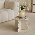 Modern White Side Table with Vase Flowers and Book Next to Sofa 3d model