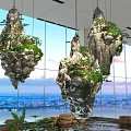 Stunning Hotel Lobby Interior With Hanging Rock Formations Green Plants And Large Windows