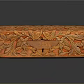 Orange Intricately Carved Decorative Ornament Set With Floral And Leaf Patterns