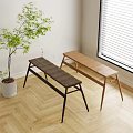 Two Long Wooden Stools In Bright Indoor Area With Green Plant And Window Blinds