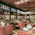Retro Style Restaurant Interior With Brick Walls Green Doors And Checkered Tablecloths