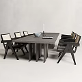 Modern Dark Wood Dining Table Set With Woven Back Chairs And Decorative Bowl Candle Holder