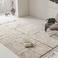 Ivory Square Rug With Geometric Pattern Tassels In White Room With Chair And Book On It