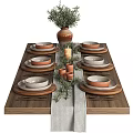 Ceramic Dinnerware Set With Plates Bowls Cutlery Greenery And Candles On Wooden Table