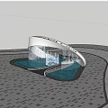 Modern Curved Sculpture With Water Feature In Urban Square Near Tall Buildings