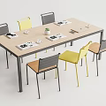 Modern Conference Table With Notebooks Cups And Small Potted Plant And Grey Yellow Brown Chairs