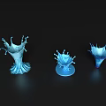 Three Blue Splash Shaped Decorative Ornament Set with Shiny Glossy Surface on Black Background