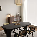 Black Oval Dining Table Set with Four Woven Seat Chairs Tray Glass Kettle Wooden Floor