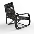 Rattan Rocking Leisure Chair with Neutral Cushion and Geometric Pattern Design