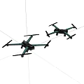 Black And Teal Quadcopter Drones With Four Propellers For Aerial Activities