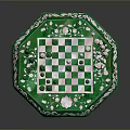 Exquisite Detailed Octagonal Green Chessboard Featuring White Floral Patterns And Colored Pieces