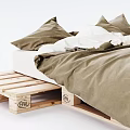 Wooden Pallet Bed Frame With Green Bedspread And White Pillows Setup