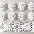 White Classical Carved Decorations With Ornate Floral Patterns And Scroll Designs For Interior Decor