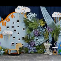Decorative Photo Check In Spot With Clouds Photo Frames Colorful Balloons Greenery And Wooden Horse