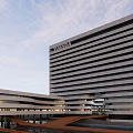 Modern Office Building Design With Circular Structure Multiple Floors And Central Courtyard