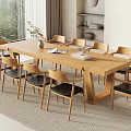 Modern Wooden Dining Table with Chairs Black Cushions Vase Magazines and Fruit Plate