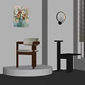 Modern Interior Featuring Wooden Chair Side Table Artwork And Wall Lamp