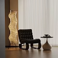 Modern Living Room Interior With Tufted Black Armchair Wavy Floor Lamp And Ceramic Side Table