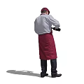 Man Wearing Red Apron And Cap Holding Wine Bottle In Hand