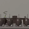 Minimalist Wooden Tea Table and Chairs with Brown Cushioned Seats Tea Set and Flower Vase