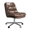Brown Leather Office Chair With Tufted Design And Silver Metal Base On Wheels
