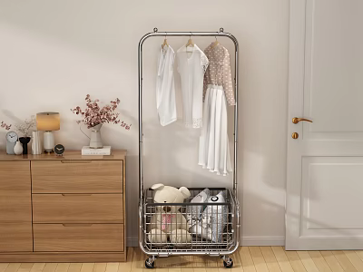 Metal Clothing Rack With Wheels Hanging Clothes And Storage Basket In Living Space 3d model