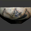 Artistic Hand Carved Bowl With Red Interior And Geometric Exterior Patterns