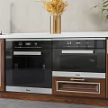 Built in Haier Kitchen Appliances With Wooden Cabinets And White Countertop