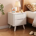 White Bedside Table with Two Drawers Wooden Lamp Candle and Photo Frame