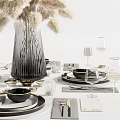 Modern Tableware Set With Black Plates Bowls Transparent Glassware Silver Cutlery And White Floral Arrangement