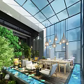 Bright Hotel Public Lounge Area With Hanging Lantern Lights Green Plants And Wooden Flooring