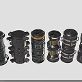 Six Black Cylindrical Mechanical Components With Different Structural And Decorative Features