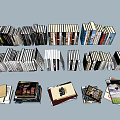 Assorted Books And Magazines Collection With Stacked Hardcover Paperbacks And Diverse Covers