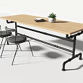 Industrial Table and Chair Set with Wooden Tabletop Black Metal Frame Gray Seats and Potted Plant