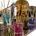 Perfume Cosmetics Collection On Metal Tray With Aromatic Bottles Reed Diffusers Candles And White Rose