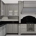 Elegant Gray Kitchen Cabinets With Ornate Carvings And Black Countertop