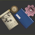 Elegant Books and Magazines with Traditional Scroll Hourglass Blue Notebook and Pink Lotus