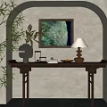 Dark Wooden Console Table With Black Sculpture Lamp Decorations Against Wall Painting And Green Plant
