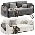 Gray And White Sofa Design With Striped Blankets Pillows And Decorative Balls