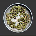 Fresh Green Peas in White Patterned Bowl Placed on Bamboo Mat