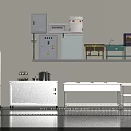 Kitchen Utensils Setup With White Cabinets Appliances Control Panel Black Cabinets Countertop And Green Plants