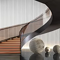 Modern Spiral Staircase With Black Handrail Wooden Steps And Metal Railing Striped Wall Decorative Balls