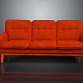 Classic Orange Three Seater Sofa With Wooden Legs And Upholstered Design