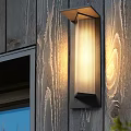 Modern Minimalist Wall Sconce With Black Metal Frame And Striped Glass Shade For Soft Lighting