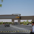Modern Entrance Gate with Logo and Cars in Busy Landscaped Area with Pedestrians