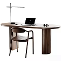 Wooden Oval Desk with Laptop Mouse Table Lamp Headphones and Matching Chair Featuring Fluted Legs
