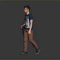 Man Walking With Blue T Shirt Pattern Brown Pants And Black Bag