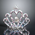 Sparkling Crown Jewelry Design With Heart Shaped Accents And Pink Gemstones