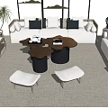 Elegant Modern Sofa Set With White Upholstery Black Cushions Coffee Tables And Wicker Chairs