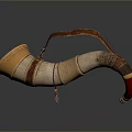 Decorative Horn Shaped Household Item With Golden Accents And Red Leather Strap